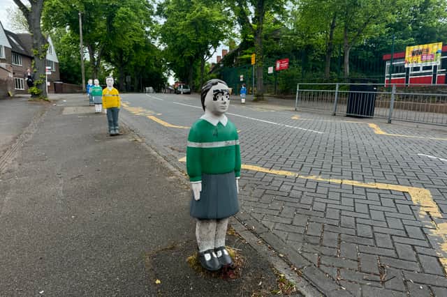 The child-like bollards in Windmill Lane act as a traffic calming measure